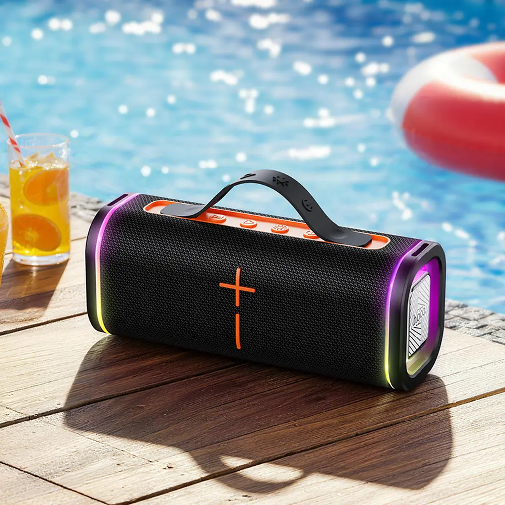Person carrying Hoco HC51 Soul sports wireless speaker outdoors during a workout